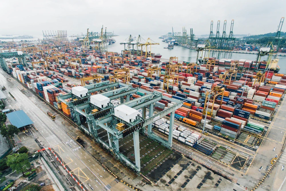 Container ship loaded with shipping containers at the Port of Guangzhou, aerial view